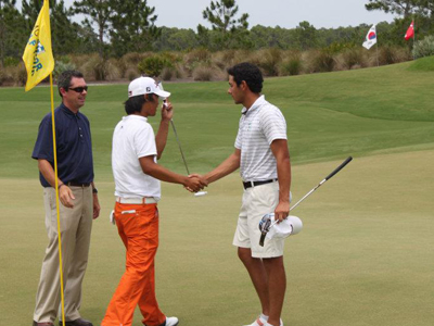 Barry Hinkley, PGA Head Professional at The Concession GC joins Keagan Cummings and Tzu-Wei Lin on the 18th green following Cummings' playoff victory Sunday